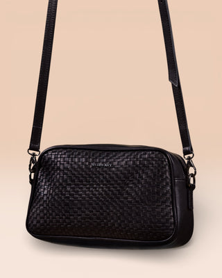 Front angled view of Afef Medium black leather crossbody bag by Benheart.