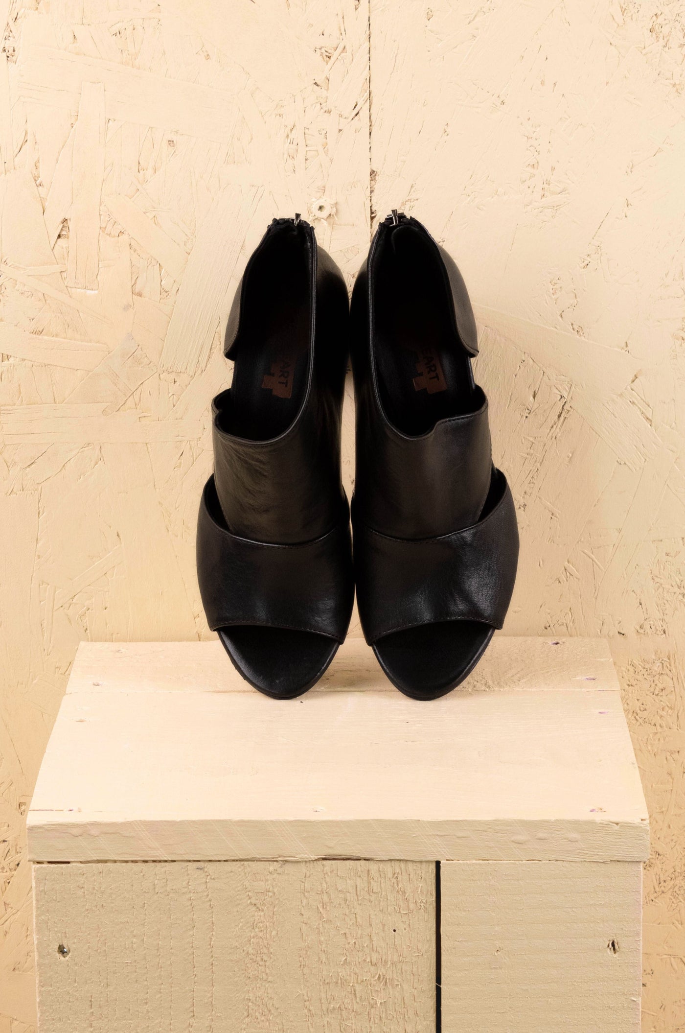 Front angled view of Aria V443 women's black buffalo leather block heel sandals by Benheart.