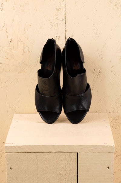 Front angled view of Aria V443 women's black buffalo leather block heel sandals by Benheart.