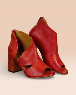 Front angled view of Aria V443 women's block heel sandals in porpora buffalo leather, open toe and overlapping front.