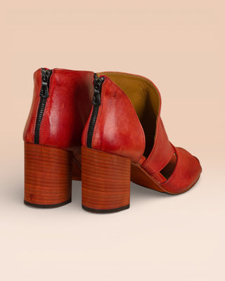 Rear-angled view of Aria V443 women's porpora buffalo leather sandals, showing heel and back design