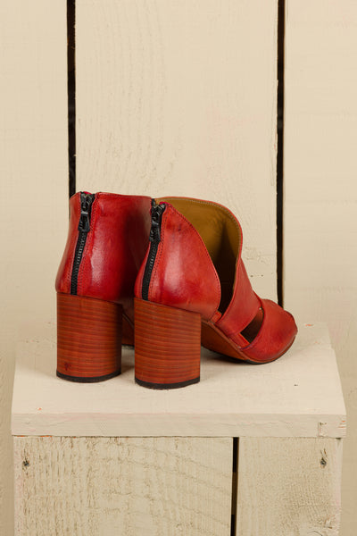 Rear-angled view of Aria V443 women's porpora buffalo leather sandals, showing heel and back design