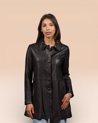 Front view of a model wearing the Mini women's leather jacket in black, handcrafted in Italy by Benheart.