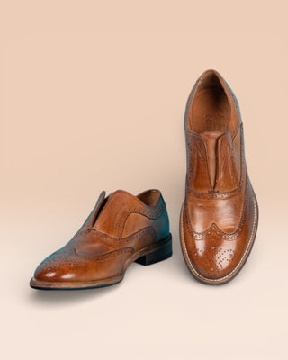 Front angled and top view of Benheart Colombo 7543 men’s cerro leather brogue slip-on shoes.