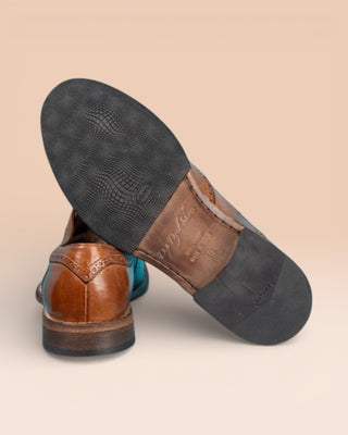 Rear view of Benheart Colombo 7543 men’s cerro leather brogue slip-on shoes with Vibram rubber sole detail.