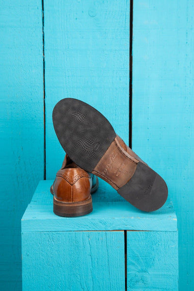 Rear view of Benheart Colombo 7543 men’s cerro leather brogue slip-on shoes with Vibram rubber sole detail.