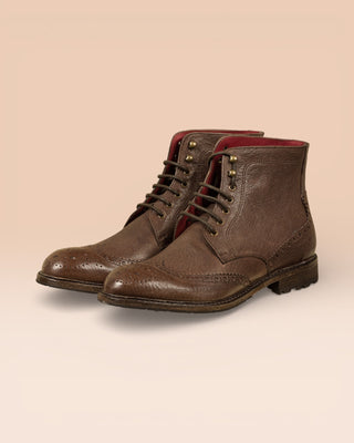 Front angled view of Benheart Daniel men’s brown leather lace-up brogue ankle boots with wingtip design