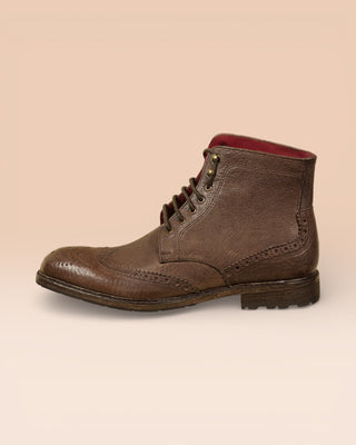 Side view of Benheart Daniel men’s brown leather lace-up brogue ankle boots with wingtip design
