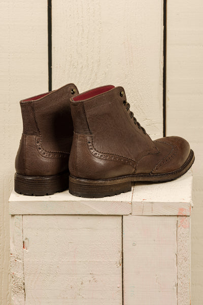 Rear view of a pair of Benheart Daniel men’s brown leather lace-up brogue ankle boots with wingtip design.
