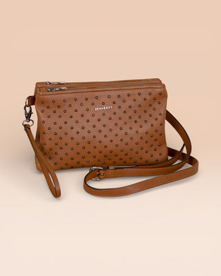 Front angled view of the Benheart Desert Pochette Borchiata in Cuoio color, handcrafted in Italy.