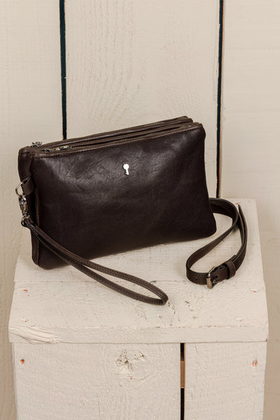 Front view of the Benheart Desert Pochette double-zip woven leather clutch in testa di moro, made in Italy.