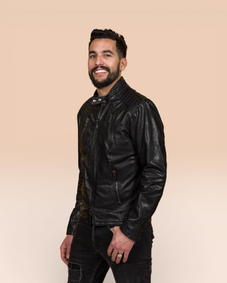 Front angled view of a model wearing the Driss men's leather jacket in black, handcrafted by Benheart in Florence, Italy.
