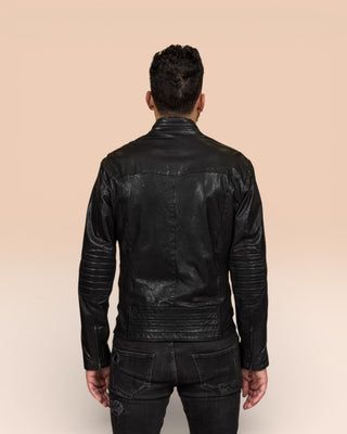 Back view of the Driss men's leather jacket in black, worn by the model.