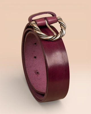 FIRENZE Benheart belt in fegato liver color  leather, rolled view on light background