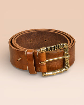 FIRENZE Benheart belt in natural cuoio leather, rolled view on light background