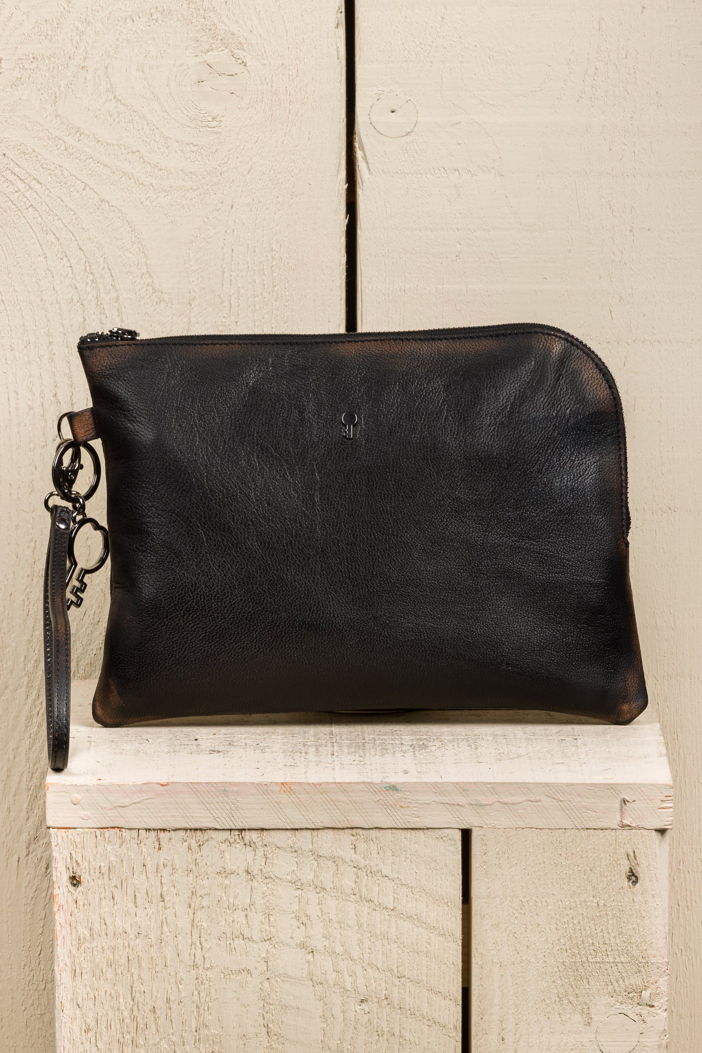 Benheart Gigi leather pouch in black beige, handcrafted in Italy, front view.