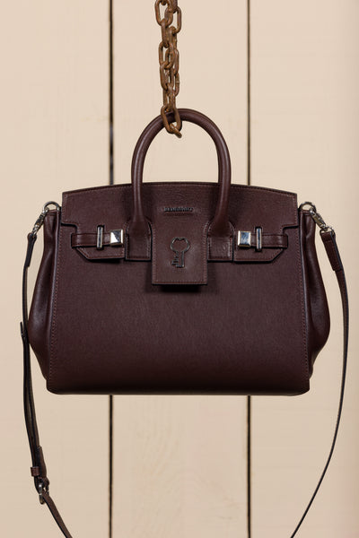 Front view of Ginevra Small chocolate lamb leather bag with gold Benheart logo, handcrafted in Florence.