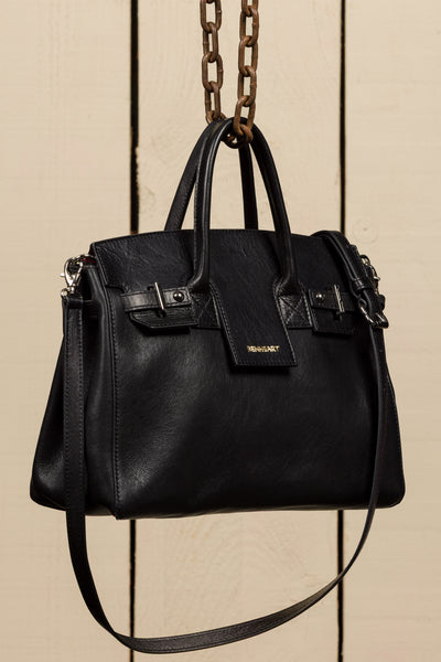 Ginevra Small black lamb leather bag, front three-quarter view with gold Benheart logo.