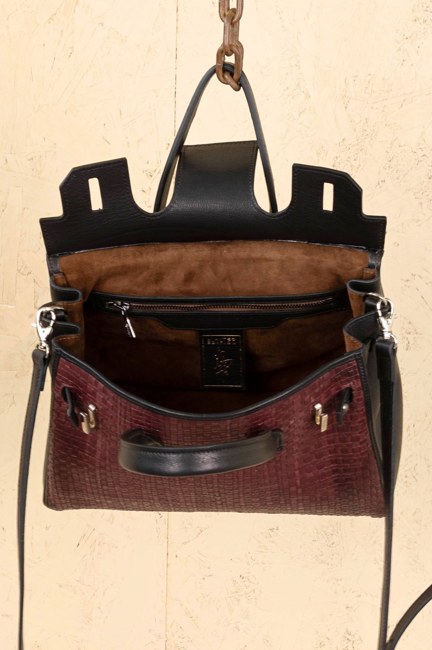 Inner details of the Ginevra Small Intrecciata woven bag in Plum color, handmade in Italy by Benheart.