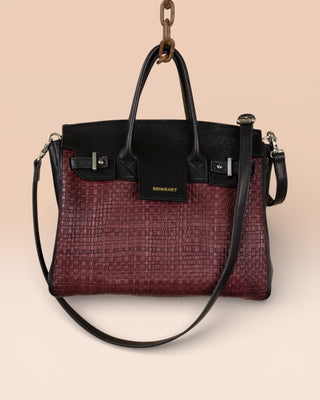 Front view of the Ginevra Small Intrecciata bag in Plum color, handcrafted in Italy by Benheart.