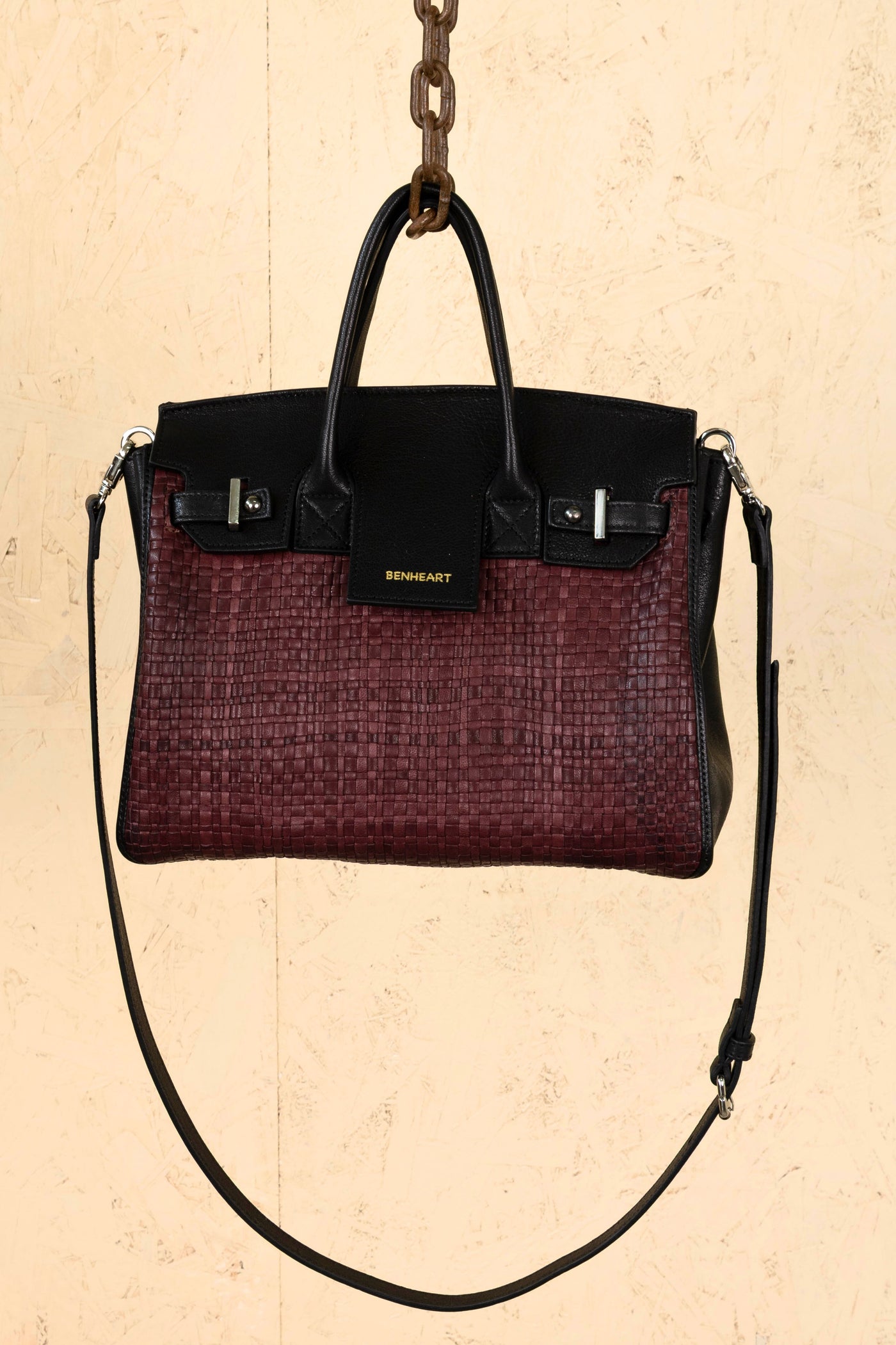 Front view of Ginevra Small Intrecciata woven leather bag in prugna (plum).
