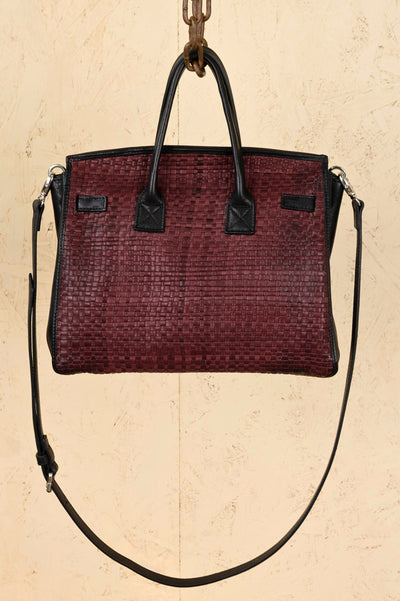 Rear view of Benheart Ginevra Small Intrecciata woven lamb leather bag in plum.