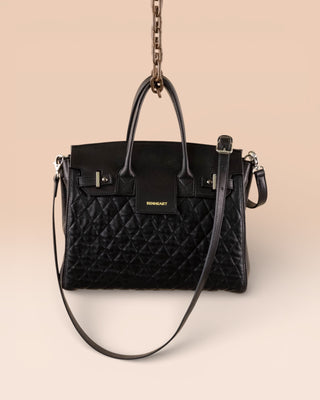 Front view of Ginevra Small Trapuntata black lamb quilted leather bag with gold Benheart logo, handcrafted in Florence.