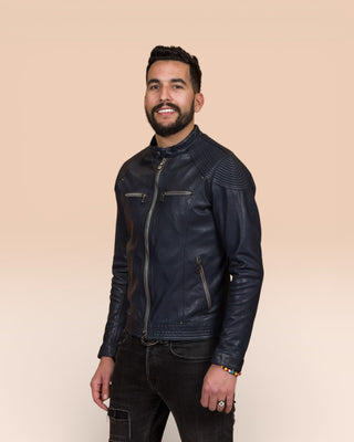 Front angled view of a model wearing the blue Hich leather jacket by Benheart.
