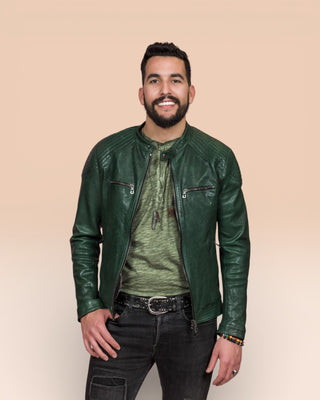 Front view of a model wearing the green Hich Limited leather jacket by Benheart, worn open.