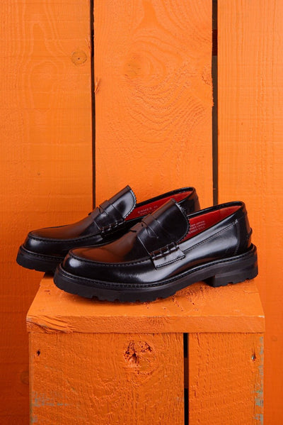 Benheart Ida Mocassino women’s penny loafers in polished black cordovan leather, front angled view.