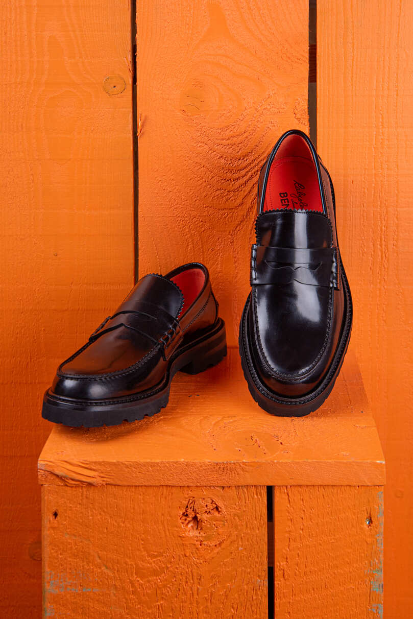 Benheart Ida Mocassino women’s penny loafers in polished black cordovan leather, front angled and top view.