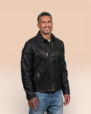 Front angled view of a model wearing the James Special goat leather jacket by Benheart, handcrafted in Florence, Italy, in black.