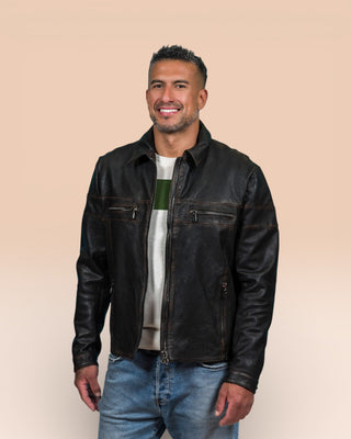 Model wearing the black James Special goat leather jacket by Benheart, shown in a three-quarter angle with the jacket open at the front.