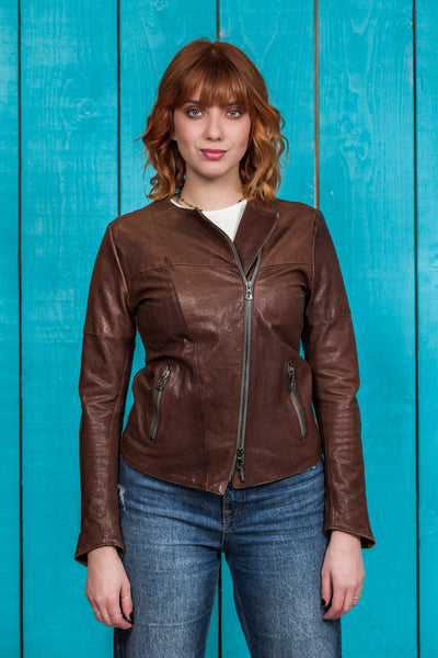 Jane women's brown leather biker jacket, worn closed by model, front view.