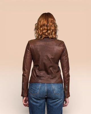 Back view of Jane women's brown leather biker jacket on model.
