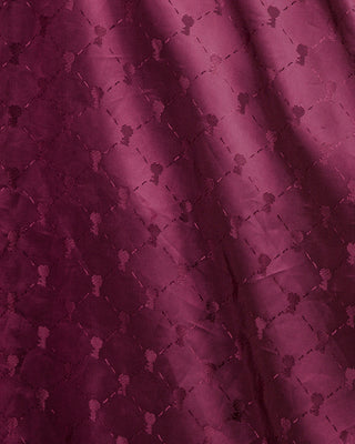 Detail of the red inner lining of the Jasmine leather jacket, featuring the heart-shaped key, a symbol of the brand.