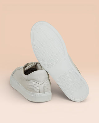 Rear view of Benheart Lario unisex perforated leather sneakers shoes in white color, rubber soles.