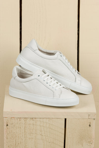 Side angled view of Benheart Lario unisex perforated leather sneakers shoes in white color.