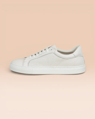 Benheart Lario unisex white perforated leather low-top sneakers, side view.