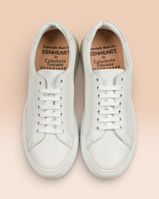 Top view of Benheart Lario unisex perforated leather sneakers shoes in white color.