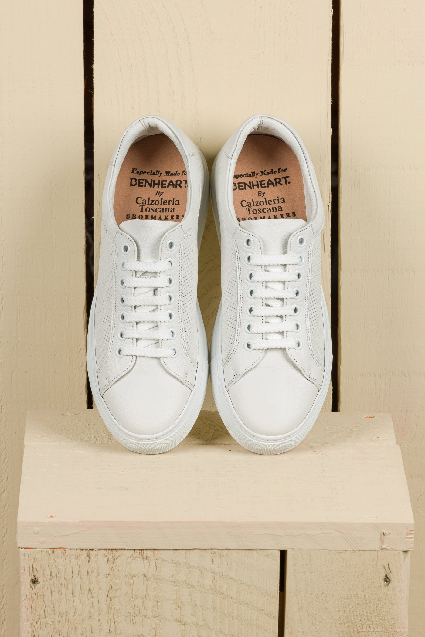 Top view of Benheart Lario unisex perforated leather sneakers shoes in white color.