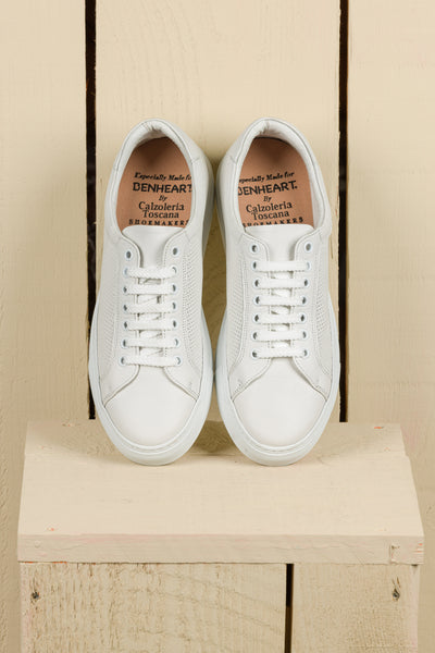 Top view of Benheart Lario unisex perforated leather sneakers shoes in white color.
