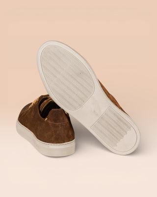 Benheart Leclerc men’s brown suede leather low-top sneakers, rear view with one shoe showing the white rubber sole.
