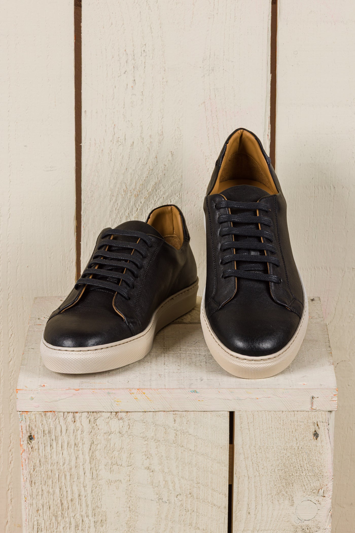 Benheart Leclerc men’s black leather low-top sneakers, front angled and top view.