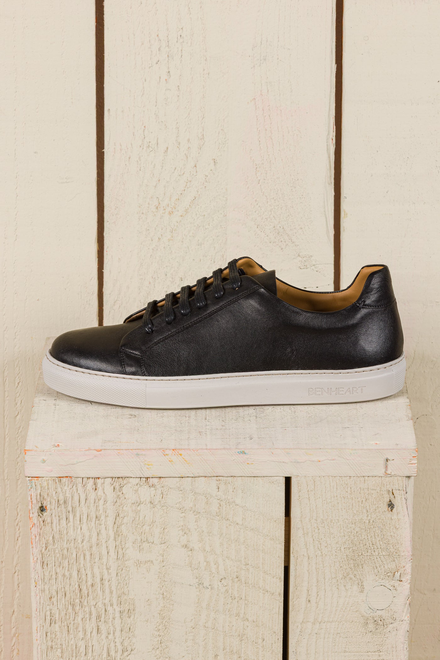 Benheart Leclerc men’s black leather low-top sneakers, side view.