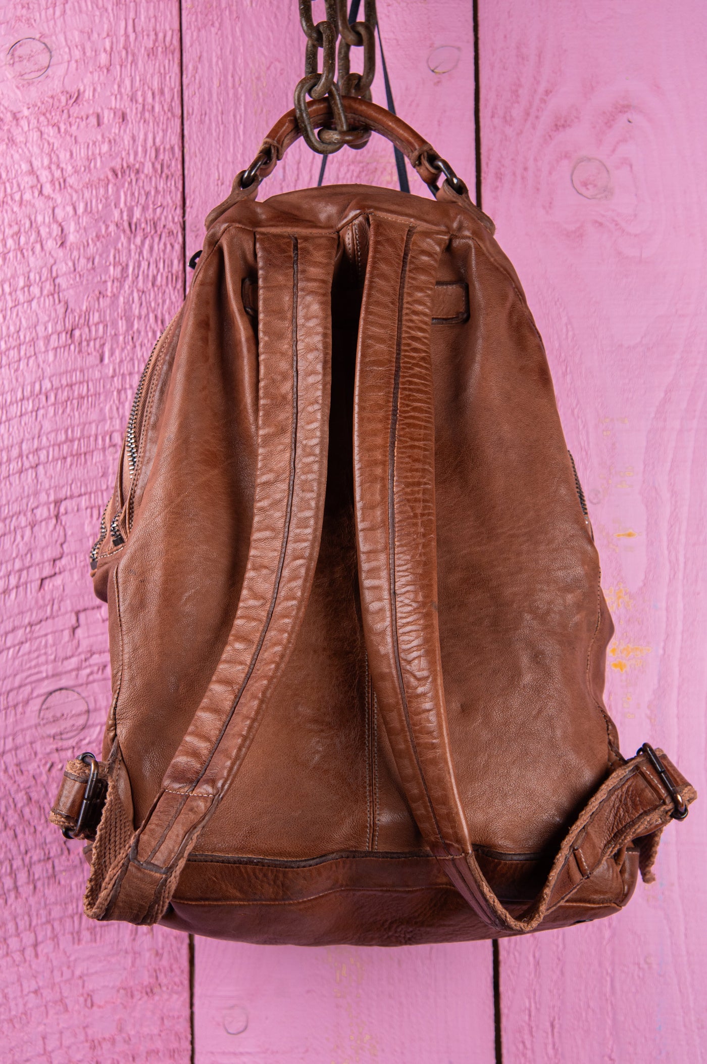 Benheart Lorenzo unisex leather backpack in cuoio, rear view showing adjustable shoulder straps.