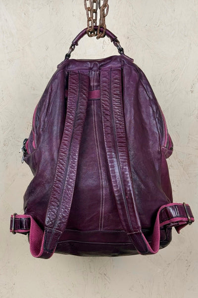 Benheart Lorenzo unisex leather backpack in plum, rear view showing adjustable shoulder straps.