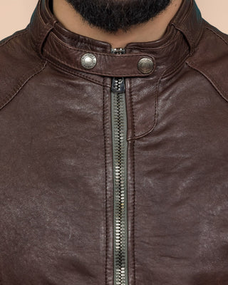 Close-up detail of the front of the Madison leather jacket by Benheart, showing the collar and zipper.