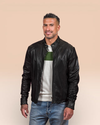 Front angled view of a model wearing the Madison leather jacket by Benheart in black, worn open.