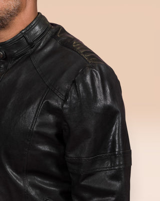 Close-up of the stitching detail on the left shoulder of the Madison leather jacket by Benheart, in black.
